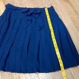 ModCloth Blue pleated skirt with tie waist and side zipper size 10
